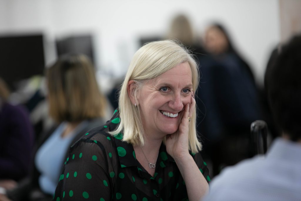 Sarah Sheppard, Practice Support Advisor, smiling at a culture day discussion at Todays Dental Resource Hub (Head Office).
